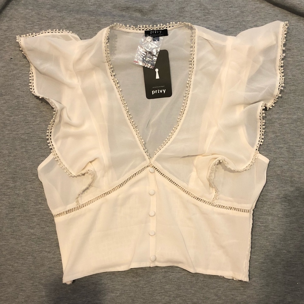 Pretty white blouse with buttons